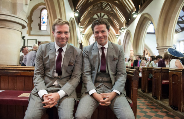 Groom and best man waiting at the church