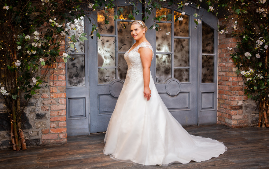 Cap sleeved plus size wedding dress