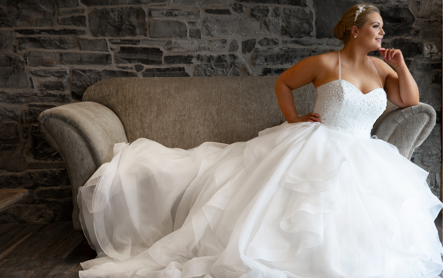 Ruffled skirted wedding dress for curvy bride