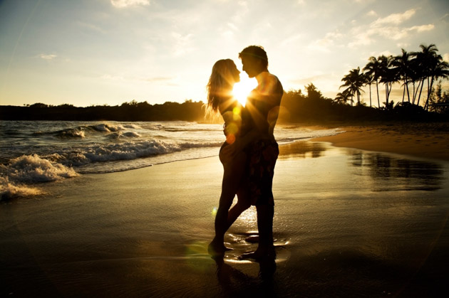 Couple On The Beach At Sunset