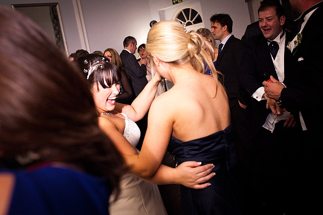 Bride dancung with bridesmaid