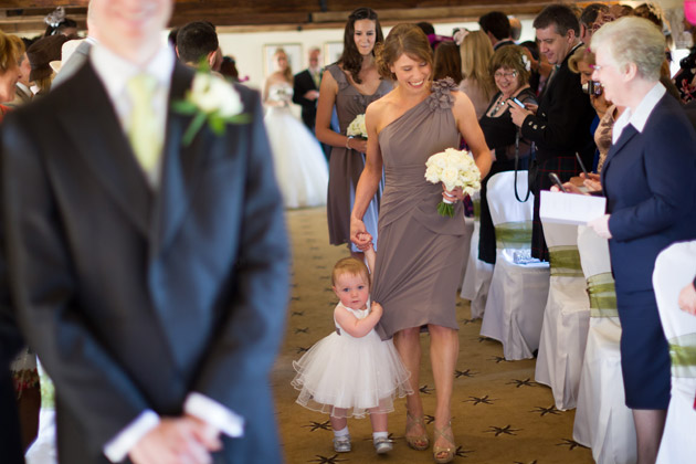 Bridesmaid and Flowergirl Walking Down the Aisle