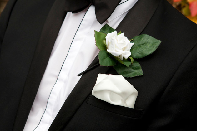 Groom's White And Green Boutonniere