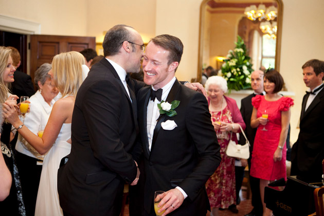 Groom Receives Congratulations From Guests