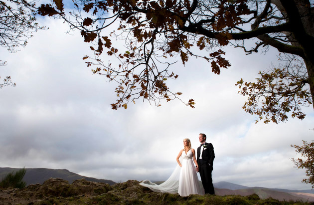 Bride and Groom Walk Outside 