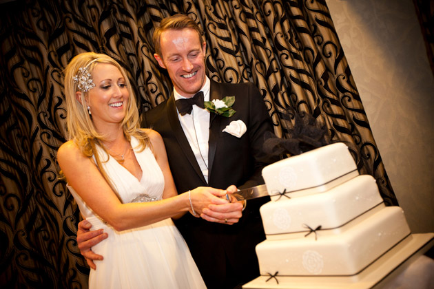 Bride and Groom Cut The Cake