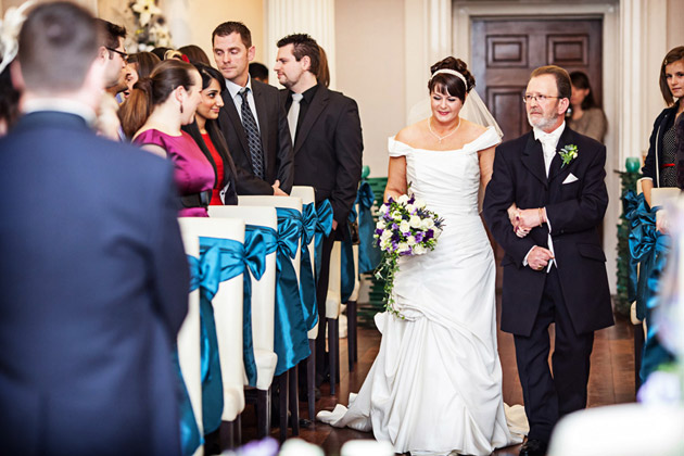 Bride And Father Walking Down The Aisle