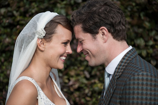 Smiling bride and groom