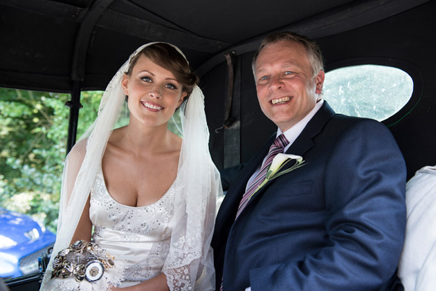 Bride and Father of the Bride in Car