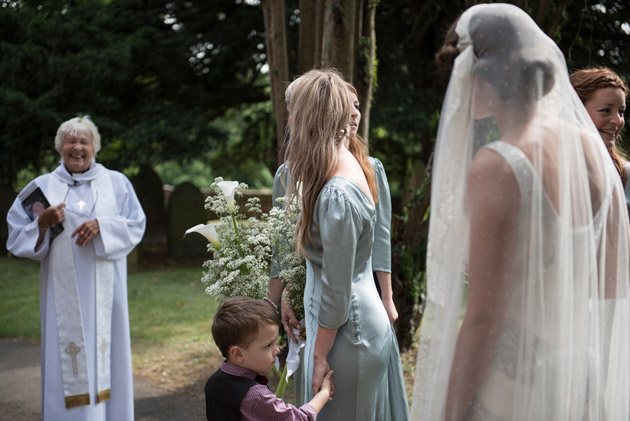 Bride Arriving at Church With Bridesmaids