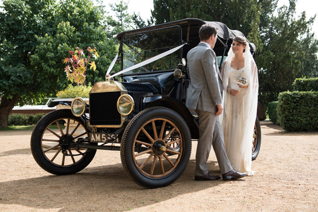 Bride and Groom with Vintage Car