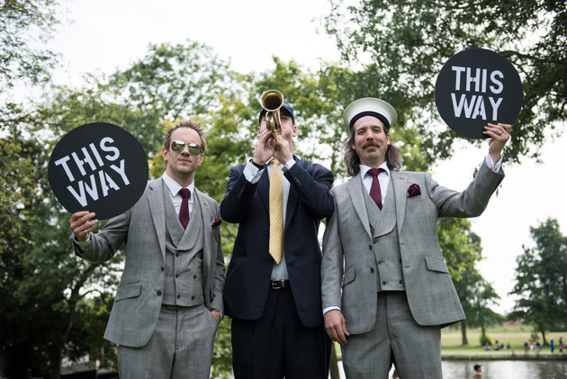 Groomsmen Call Guests to Boat