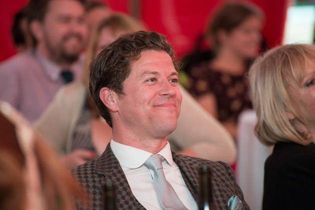 Groom Listening to Speeches