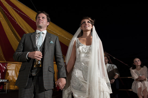 Bride and Groom Watching Band Onstage