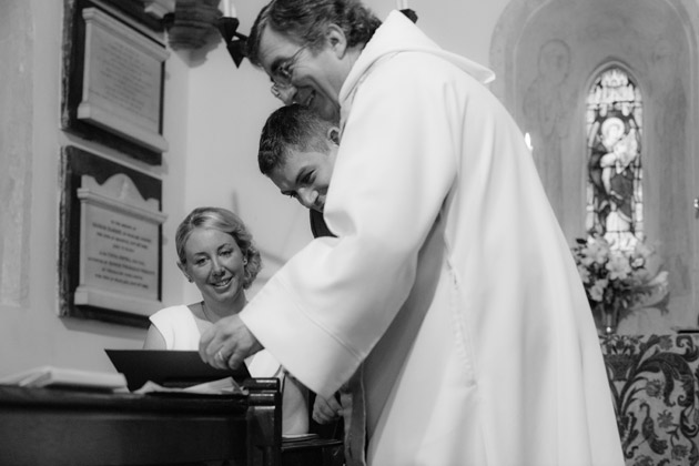 Newlyweds Sign the Register