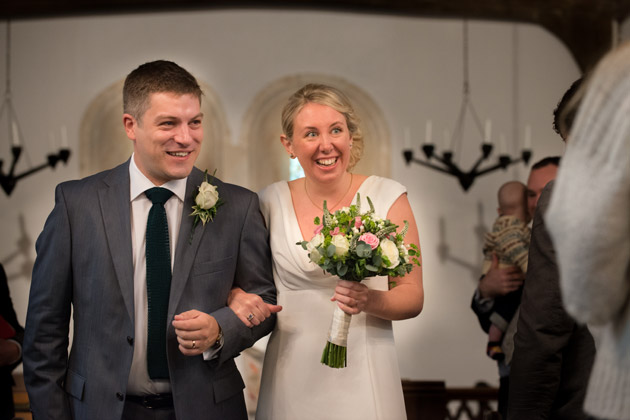 Newlyweds Leaving the Church