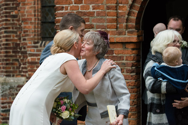 Bride in Receiving Line Greeting Guests