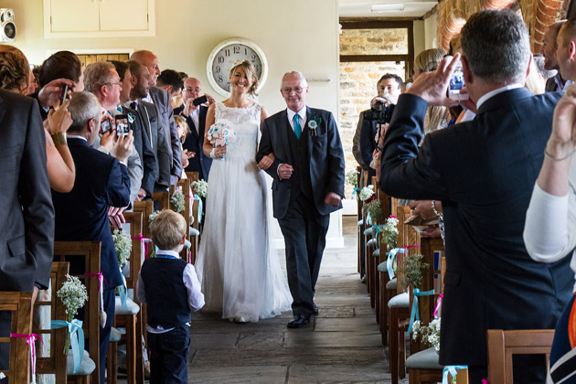 Bride and Father of the Bride Walking Down the Aisle