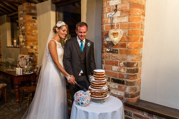 Bride and Groom Cutting the Cake