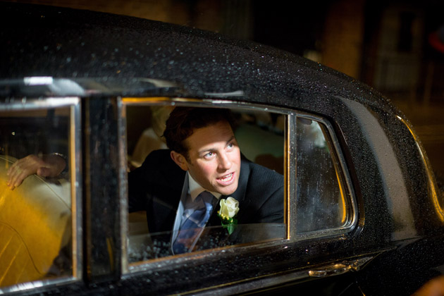 Bride and Groom Driving to Reception