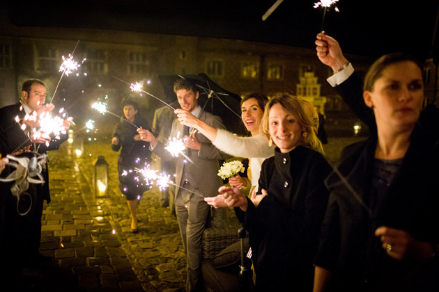 Guests wit Sparklers Waiting for Newlyweds