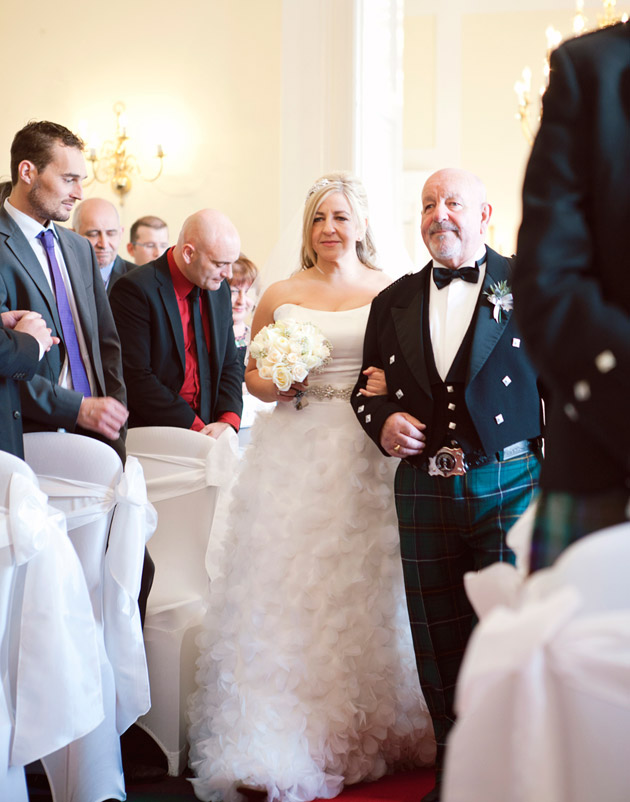 Bride and Father of the Bride Walking Down the Aisle