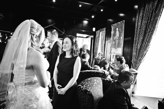 Bride Chatting with Guests at Reception