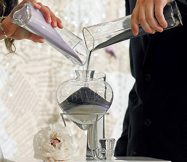 Bride and groom pouring sand