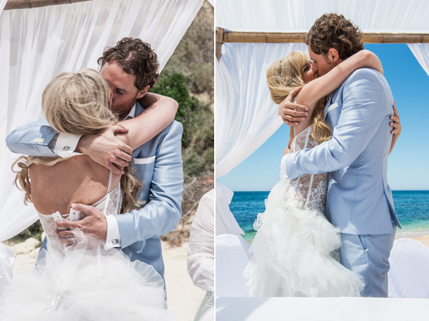 Bride and groom first kiss