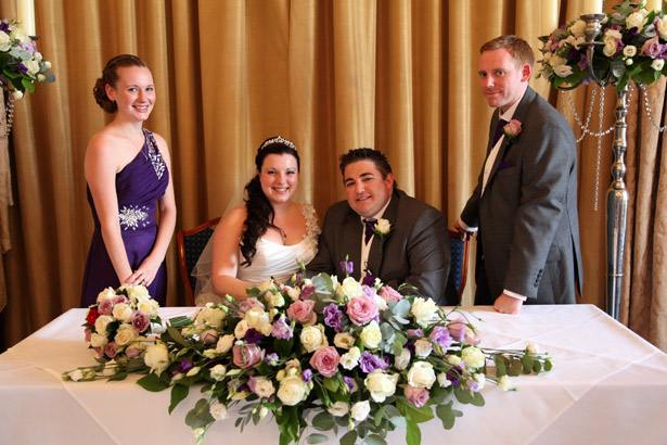 Newlyweds with chief bridesmaid and best man