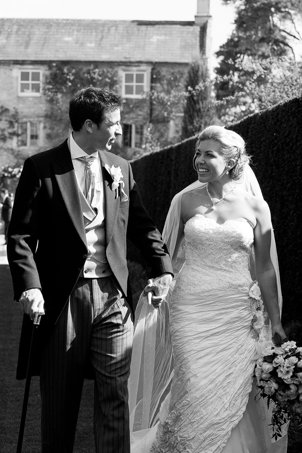 Newlyweds Walking Through Garden