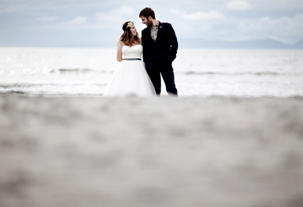 The bride and groom on a beach 