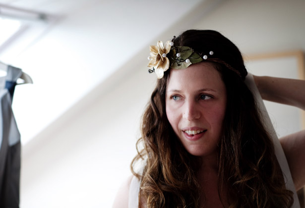 Bride wearing a head piece 