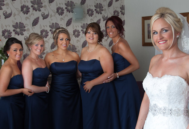 Bride-and-her-bridesmaids-in-their-blue-dresses