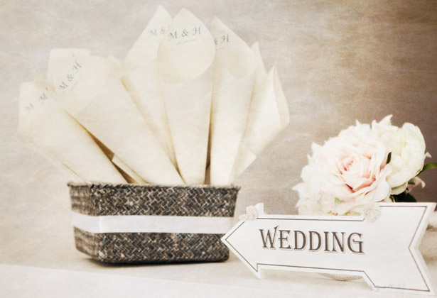 Confetti cones and wedding arrow sign 