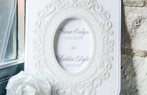 White vintage laser cut wedding stationery