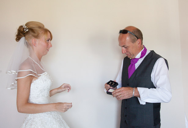 Bride giving her father a gift