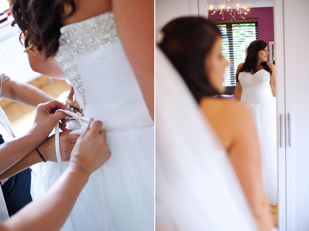 Bridesmaid helping bride get ready1