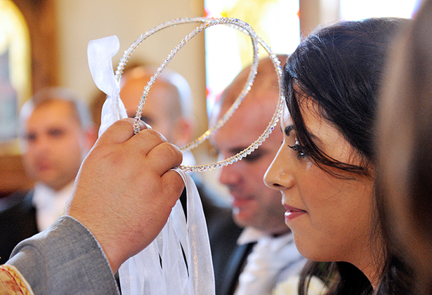 Bride and groom Greek wedding ceremony