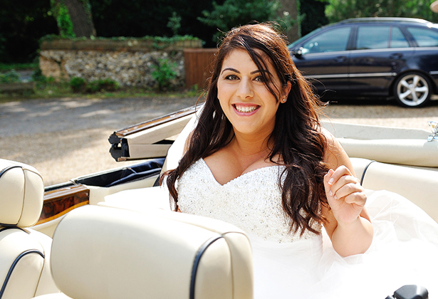 Bride arriving in vintage car    