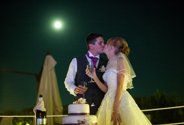 Cutting their wedding cake