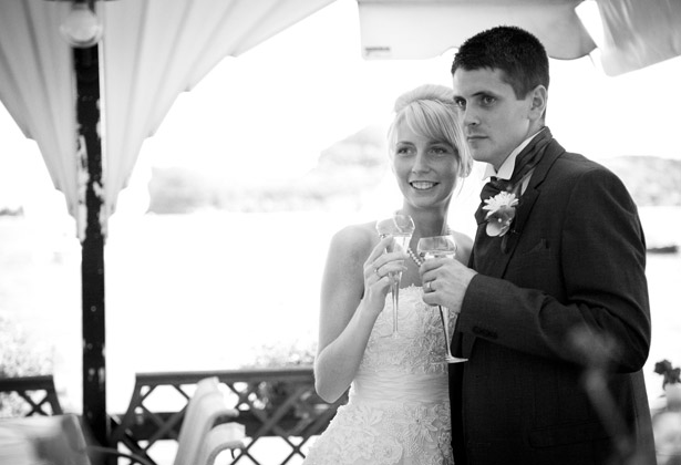 Newlyweds toasting their marriage