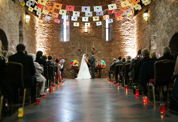 The bride and groom at the alter