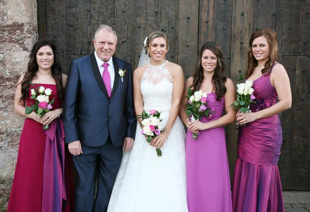 The bride with her father and bridesmaids