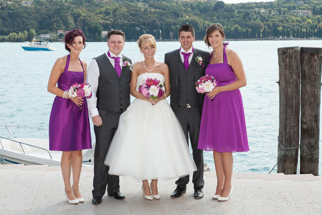 The newlyweds with bridesmaids and groomsmen