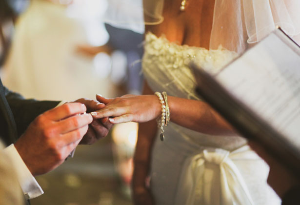 Couple exchanging rings 