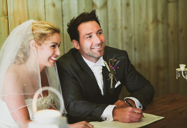 Bride and Groom signing 