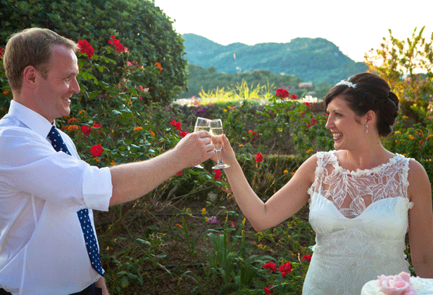 Newlyweds toasting their marriage