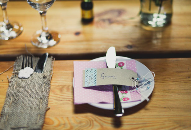 Rustic place card and pink floral napkins 