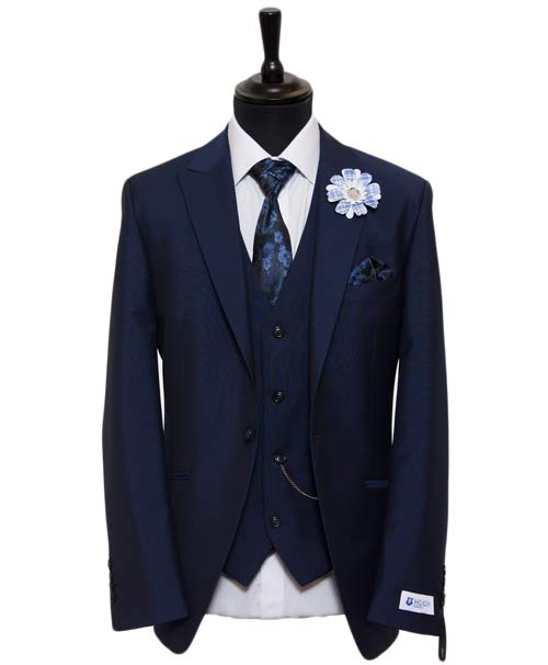 Navy blue suit for the groom with waistcoat by Hugh Harris 